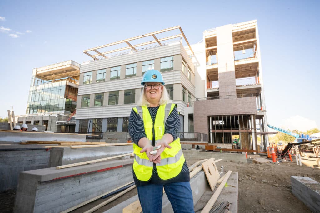Darden Coors holds pottery shards
