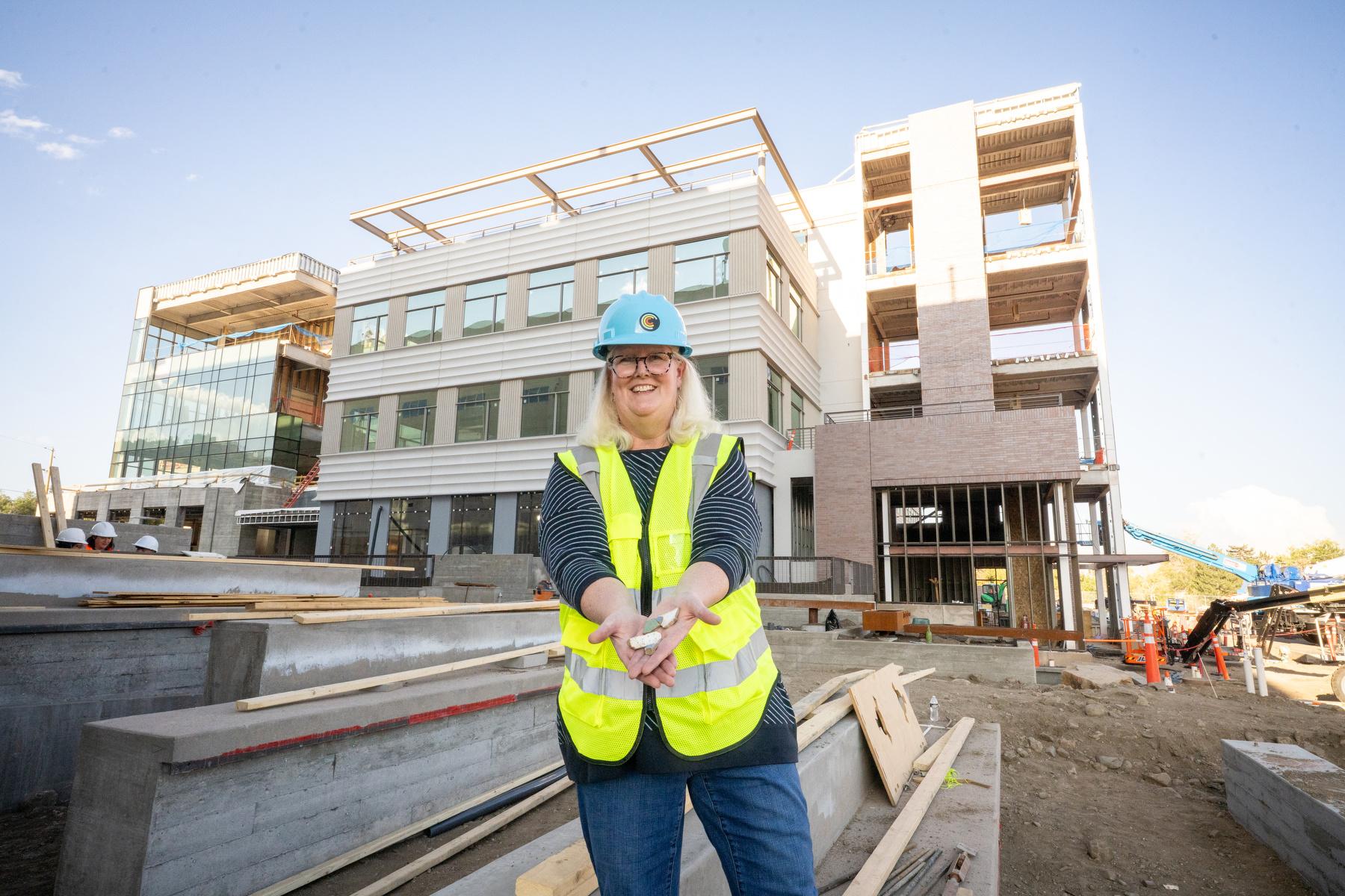 Darden Coors holds pottery shards