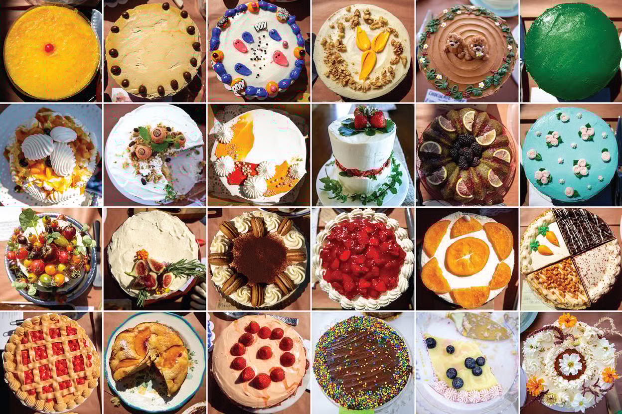 A collection of various cakes and desserts, each with different flavors and toppings.