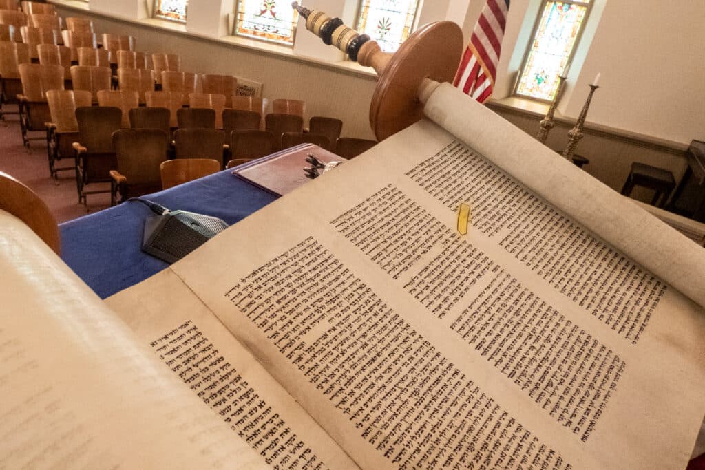 sacred torah scroll written in hebrew