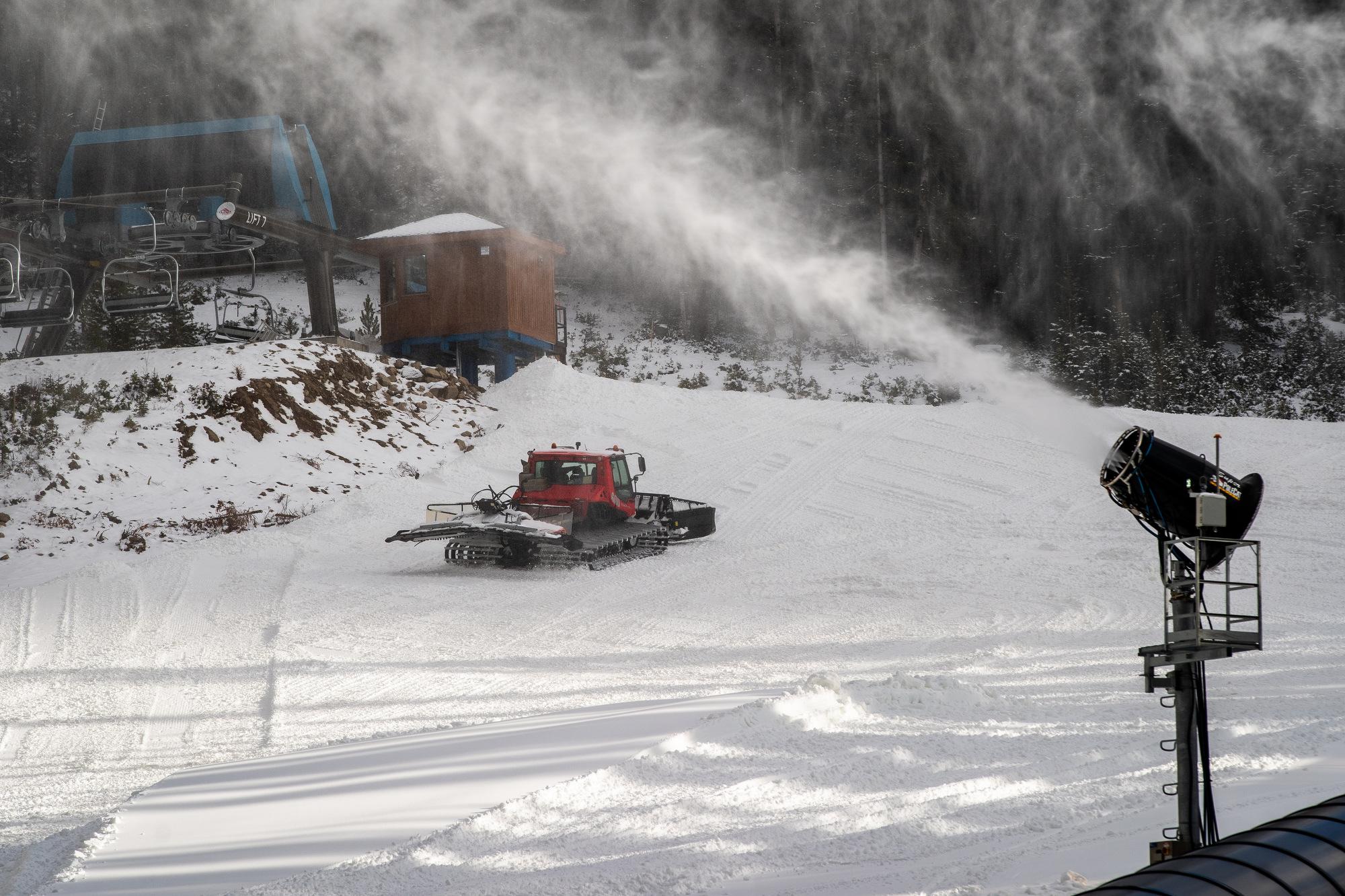 Making snow at Loveland Valley as a snow cat moves uphill