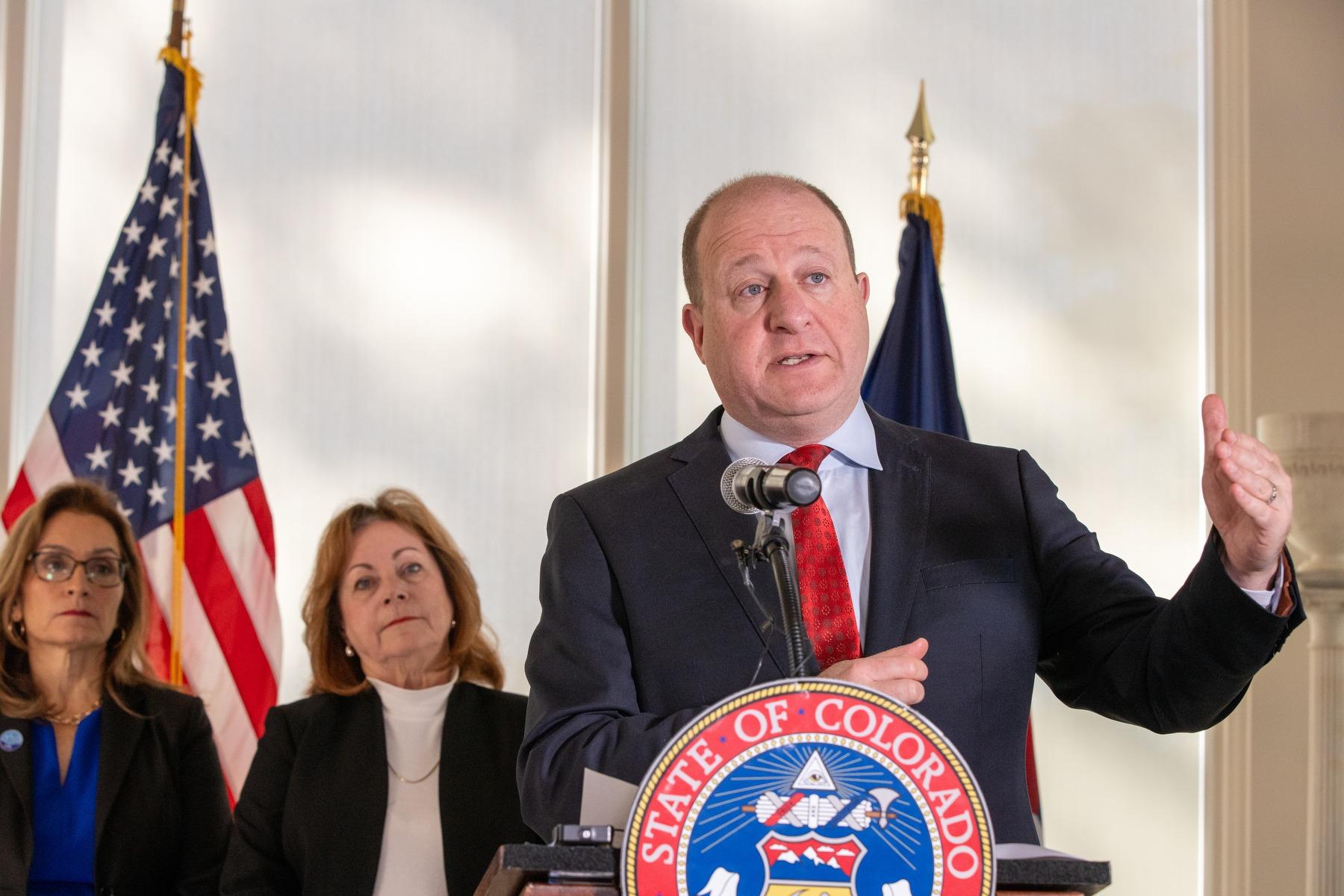 Colorado Governor Jared Polis speaks at a press conference