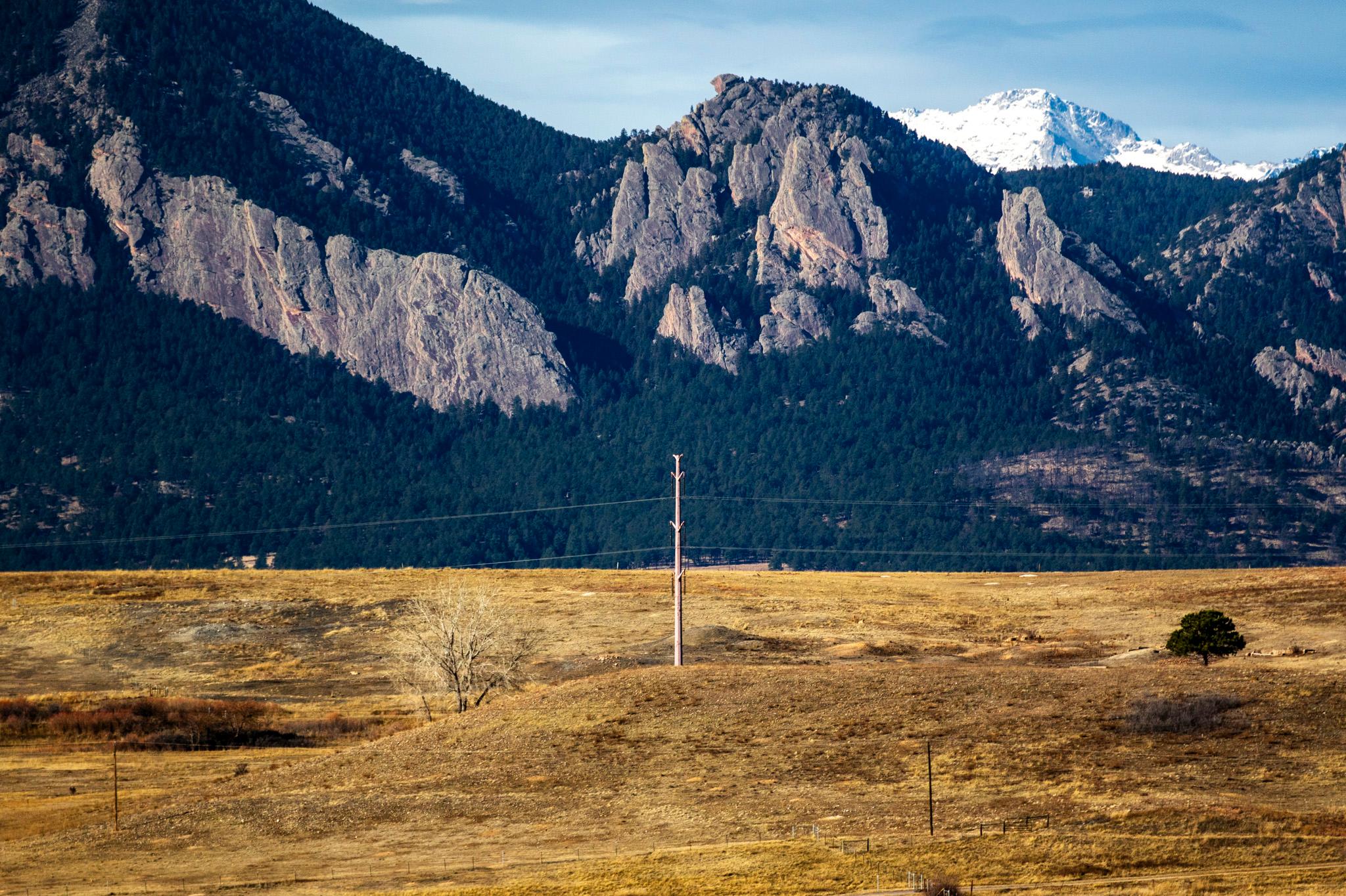 Utility lines stretch across Boulder County on a windy day. Dec. 17, 2025.