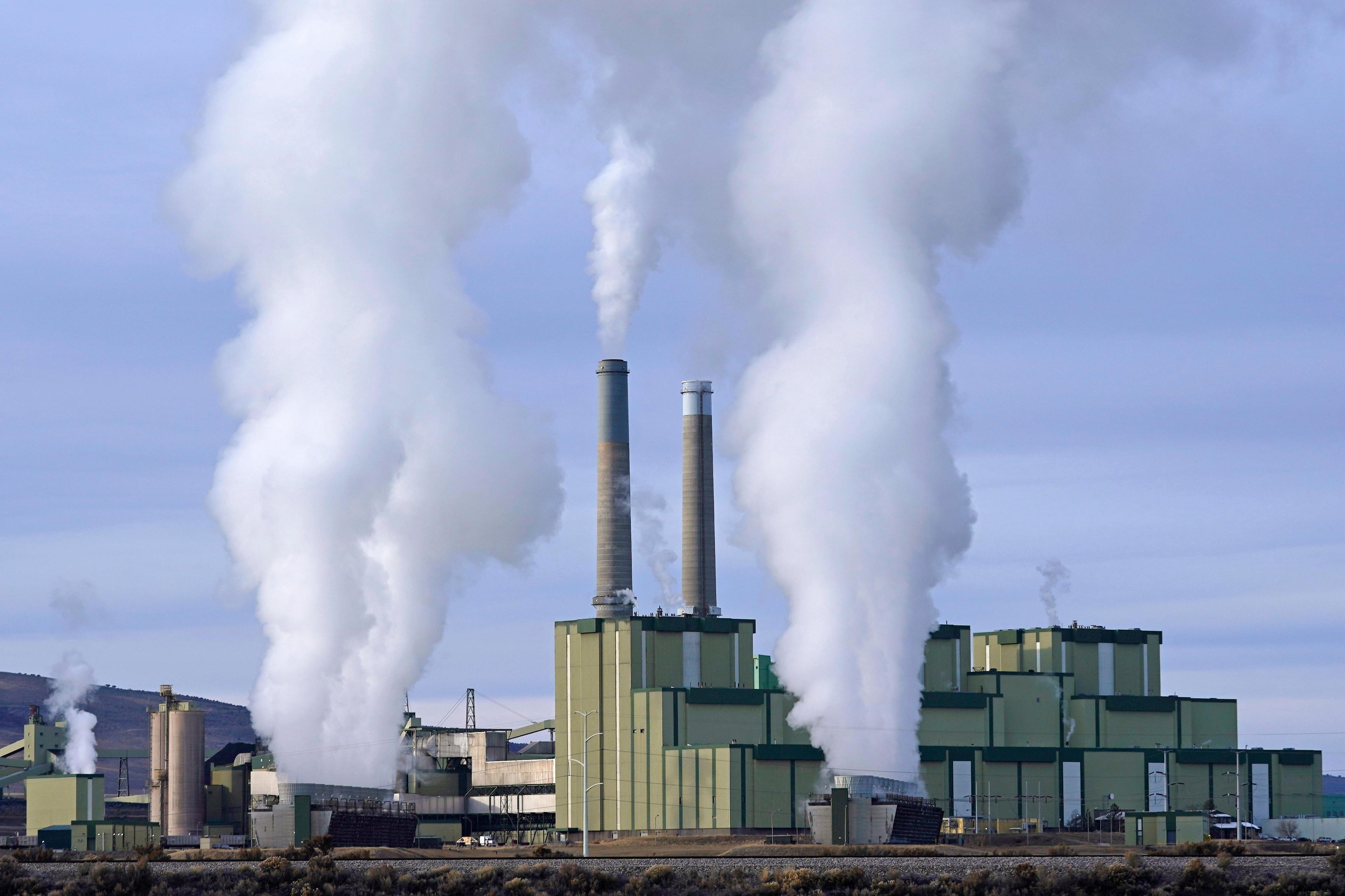 Steam billows from a coal-fired power plant in Craig, Colo.