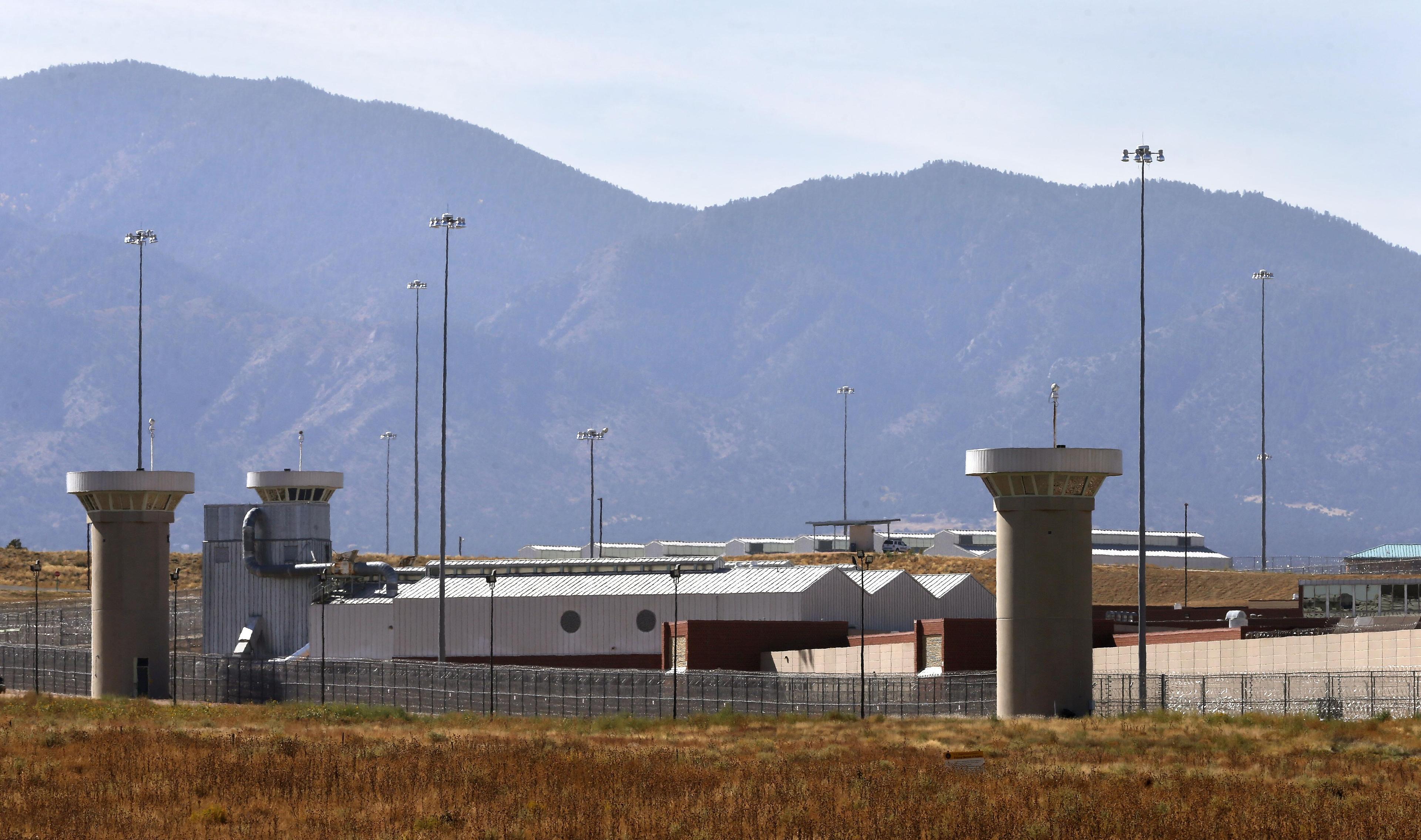 A guard tower looms over a federal prison complex which houses a Supermax facility outside Florence, Colo., in 2015.
