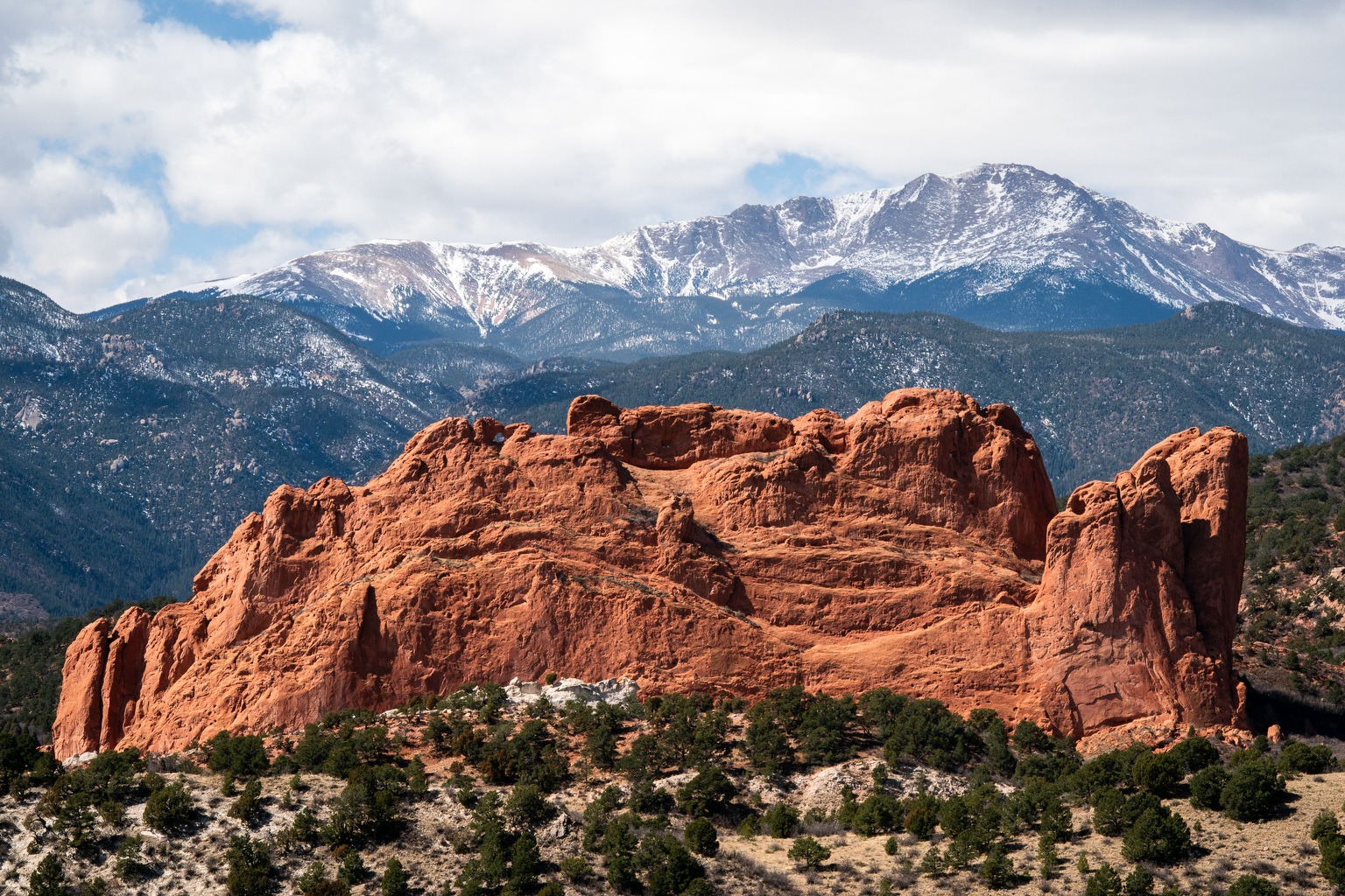 Pikes Peak looms over Garden of the Gods in Colorado Springs