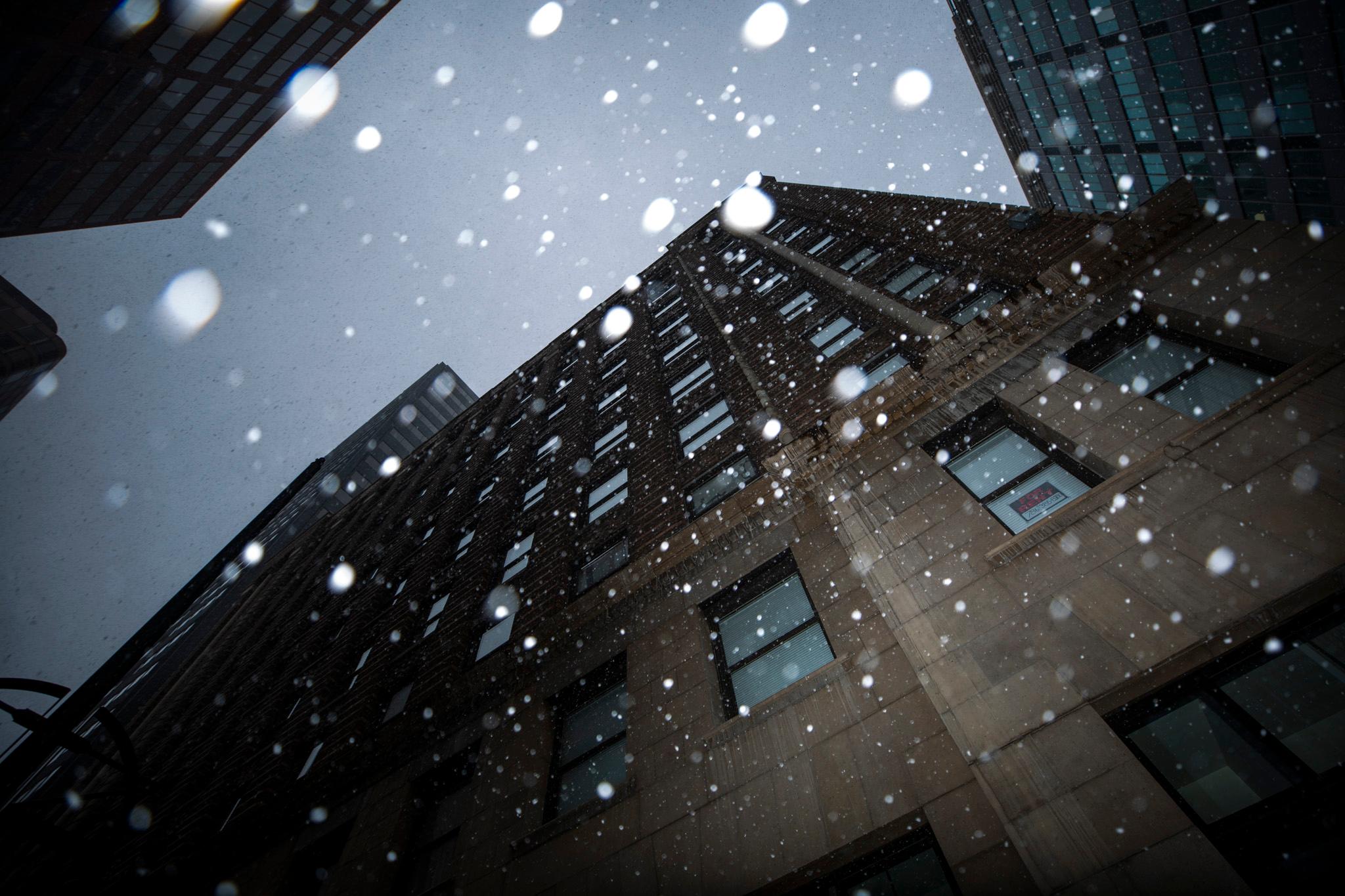 Snow falls over downtown Denver. Jan. 8, 2025.