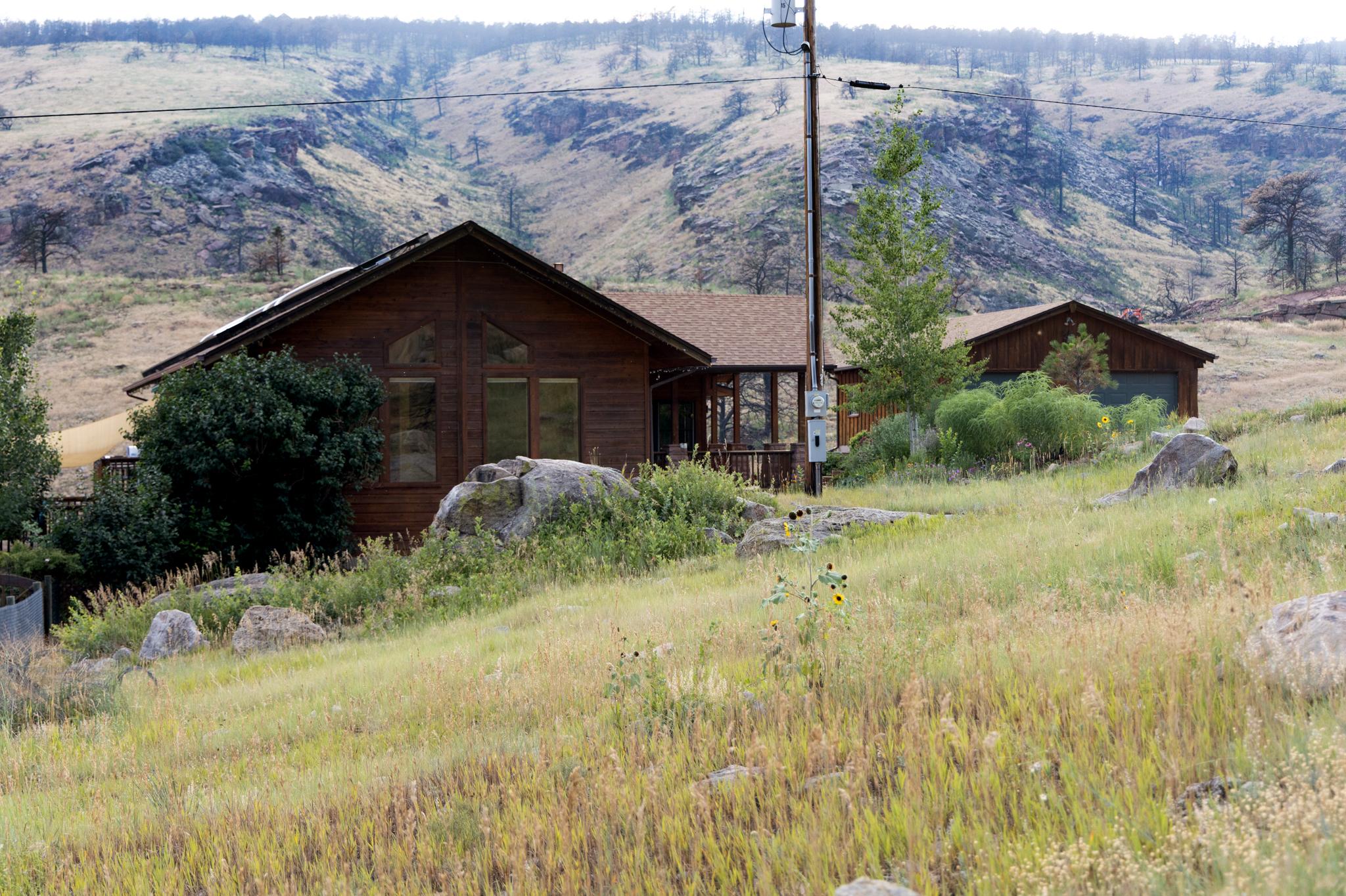 Nick Schneider and Erica Ellingson’s wooden home outside Lyons, CO.