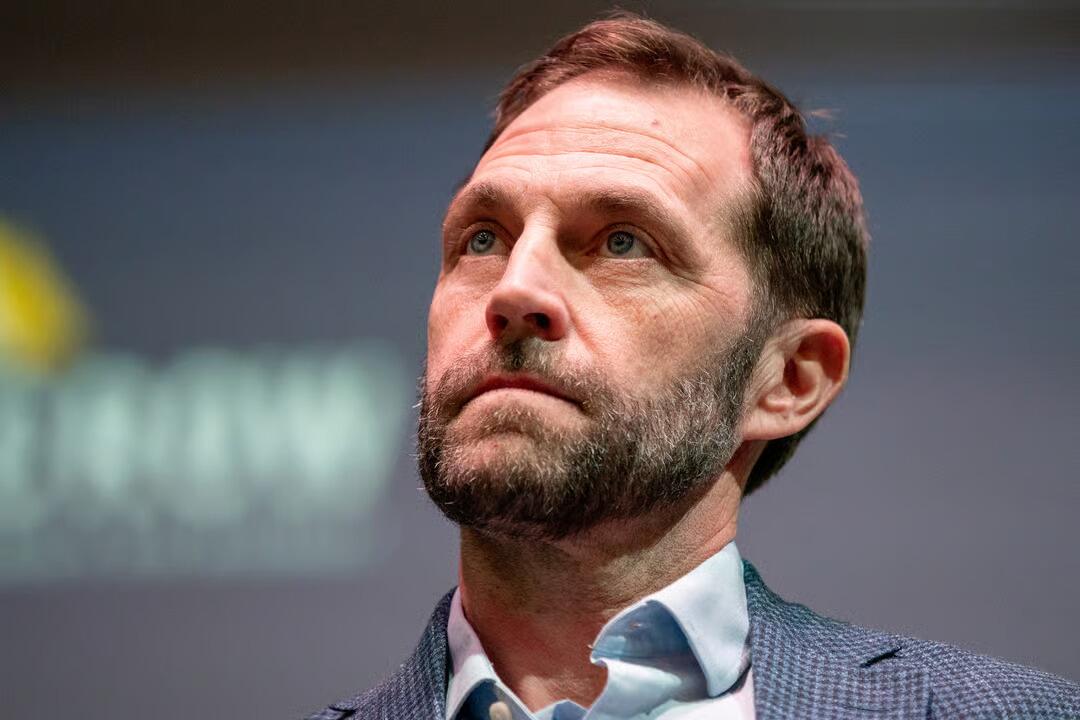 Democratic Rep. Jason Crow holds a town hall in Aurora on August 22, 2025. He's currently under investigation by the U.S. Department of Justice over a so-called 'seditious' video he participated in urging military service members not to follow illegal orders.