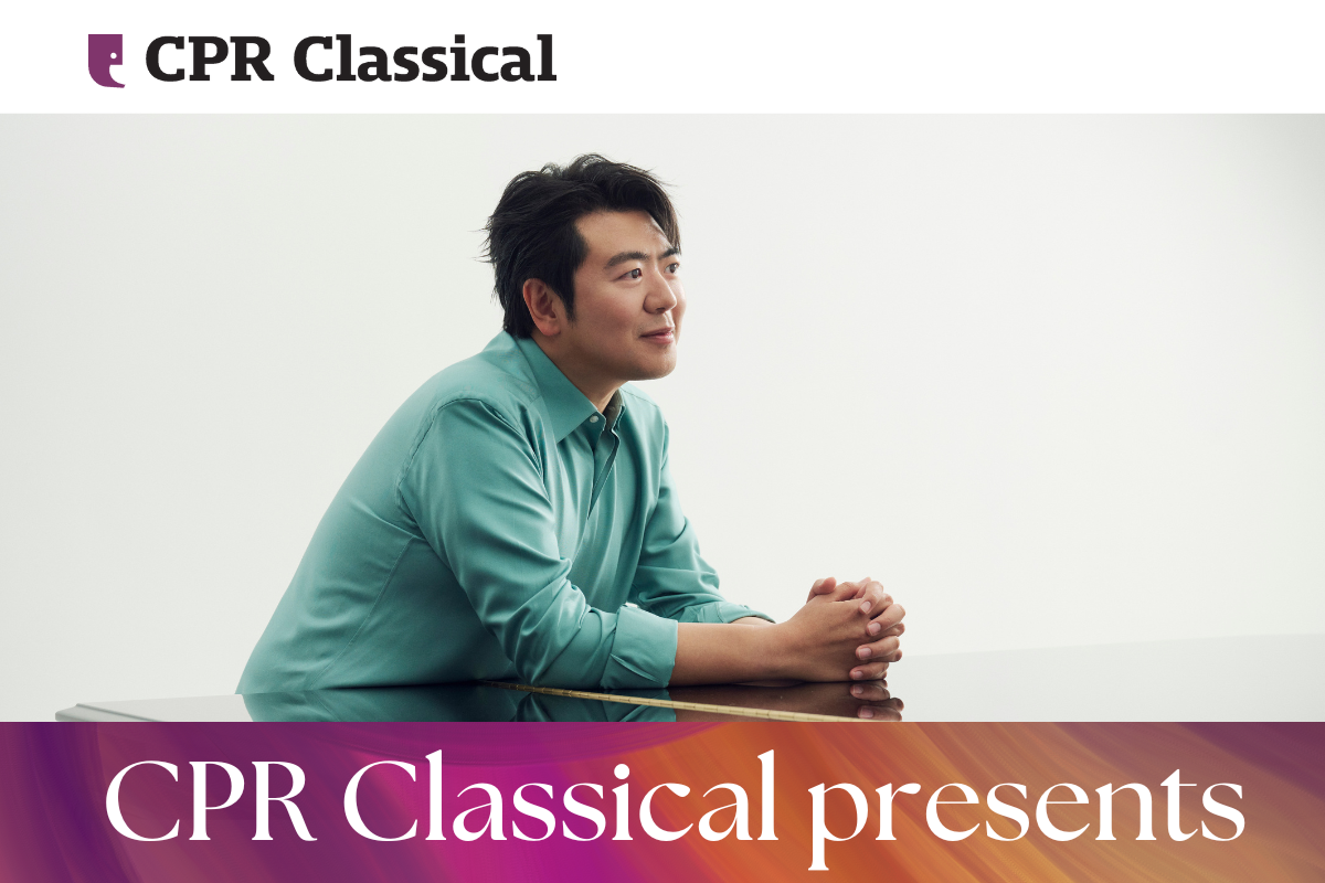 A man leaning on the top of a piano.