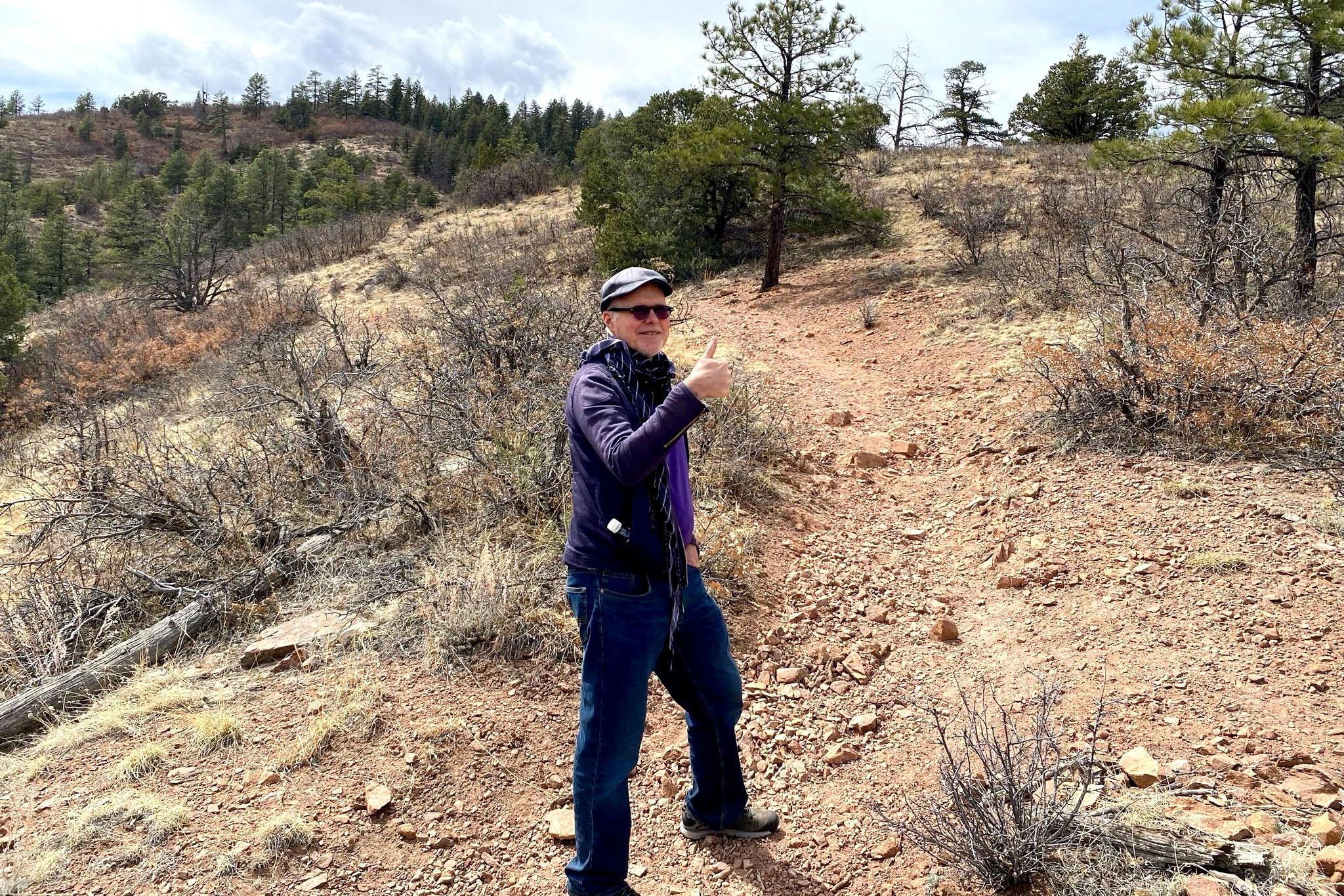 Dennis Coyle hikes to an old fire tower in Beulah Mountain Park.