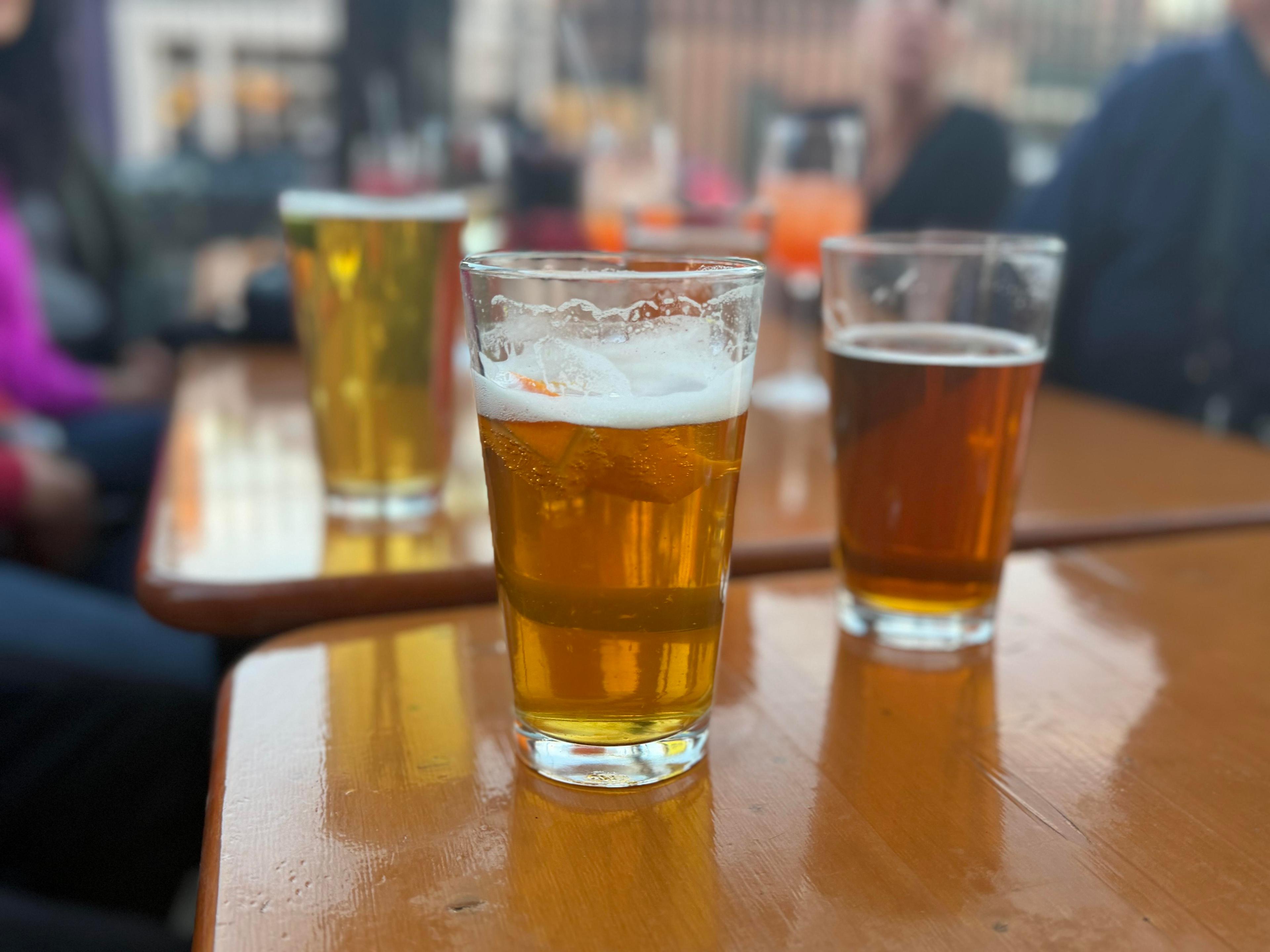 State lawmakers are reviving a proposal to place new fees on alcoholic beverages in Colorado to help fund addiction services. The fees would apply to beer, wine and spirits manufacturers and wholesale distributors. Pictured are several beers at a bar in Denver on Friday, Feb. 6, 2026.