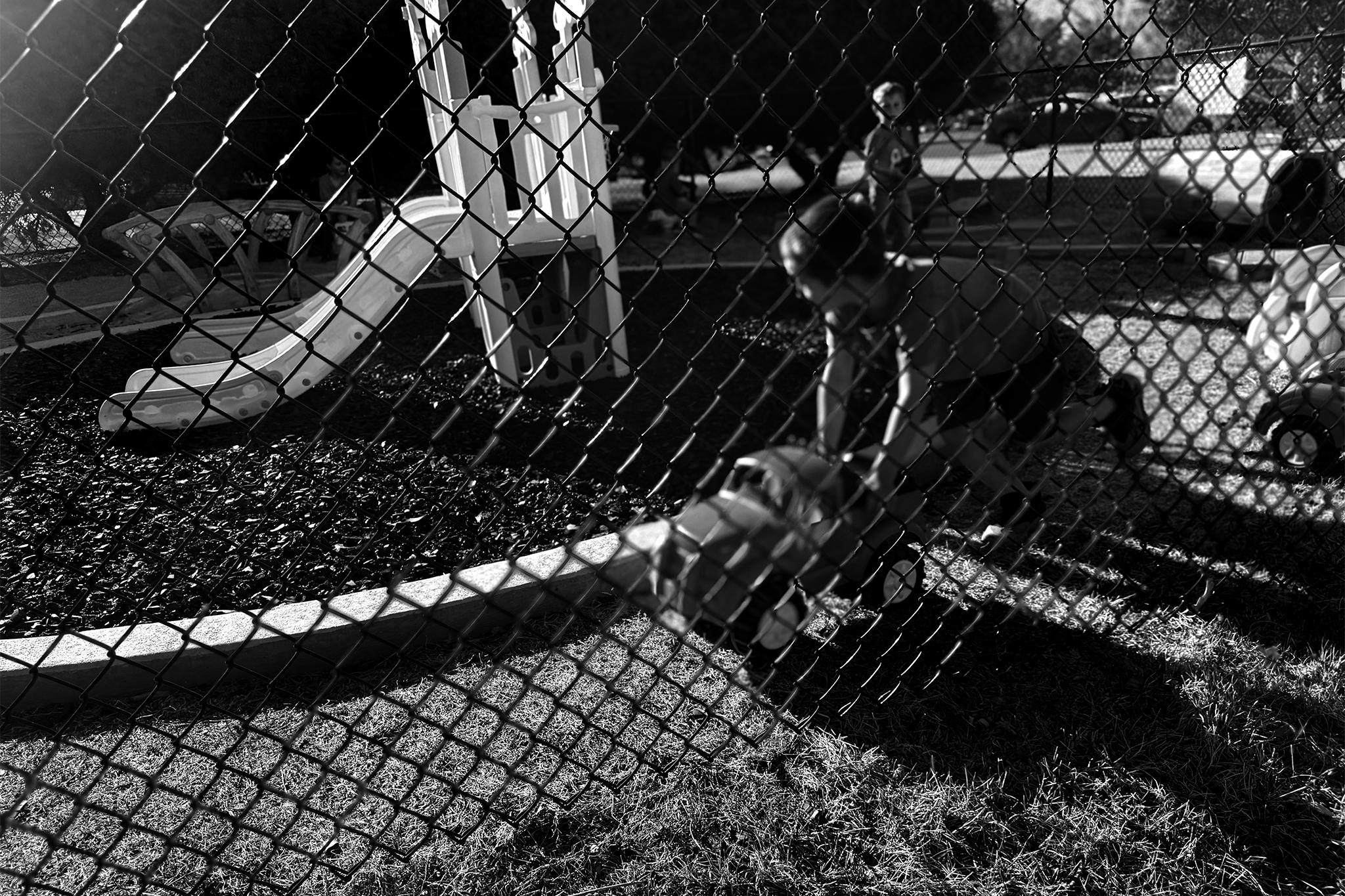 Kids scoot around the playground at Fort Morgan's Evans Early Childhood Center. March 18, 2026.