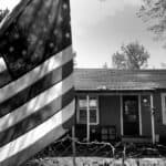 The American Flag hangs on the front fence of Olathe resident Mars Moreno's home west of Olathe, Colo., April 28, 2026.