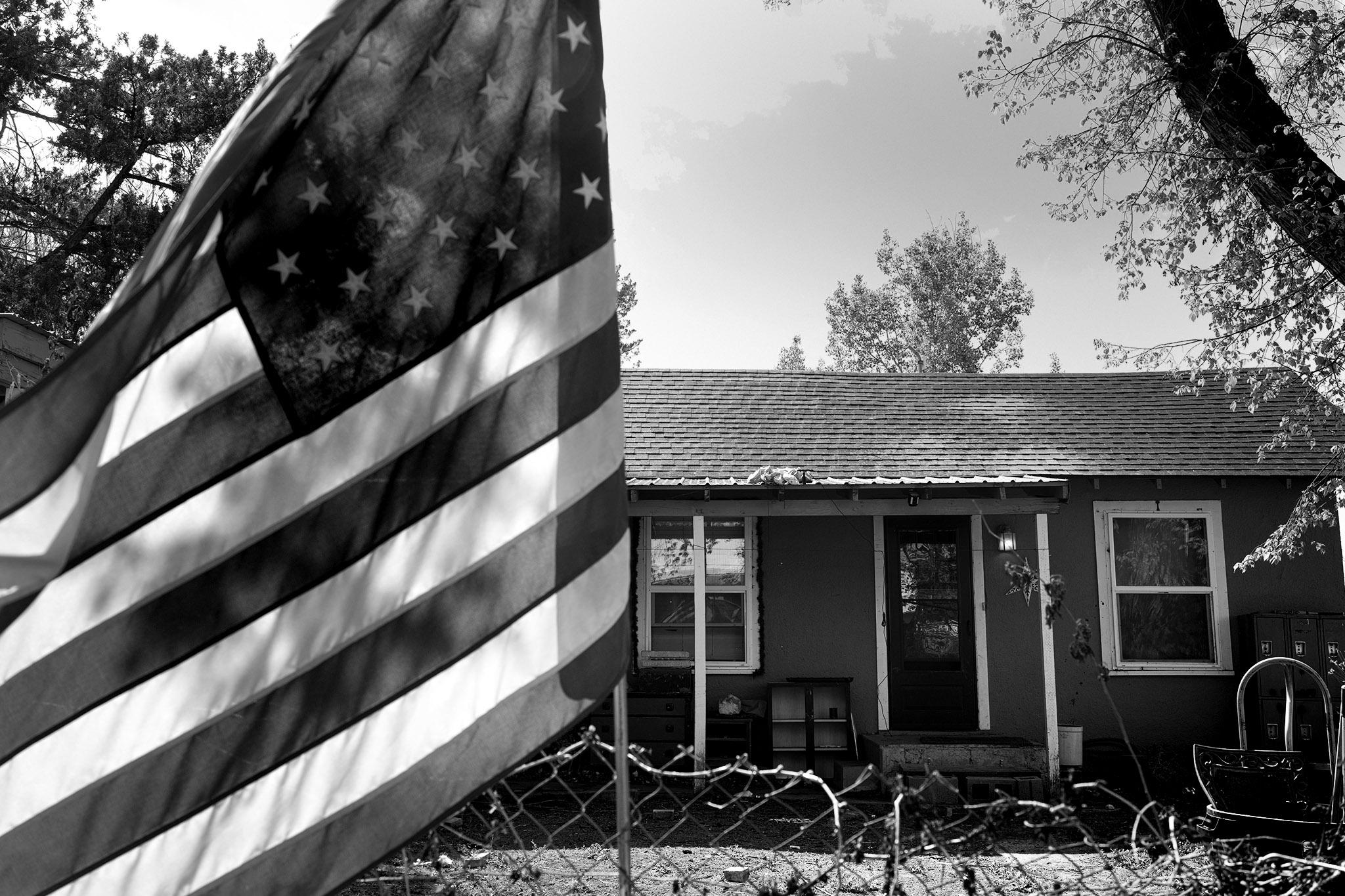 The American Flag hangs on the front fence of Olathe resident Mars Moreno's home west of Olathe, Colo., April 28, 2026.